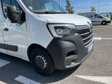 a white van that is parked in a parking lot