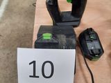 the corded drill is sitting on the table next to the corded drill