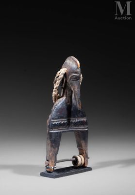an image of a statue of a horse with a long mane