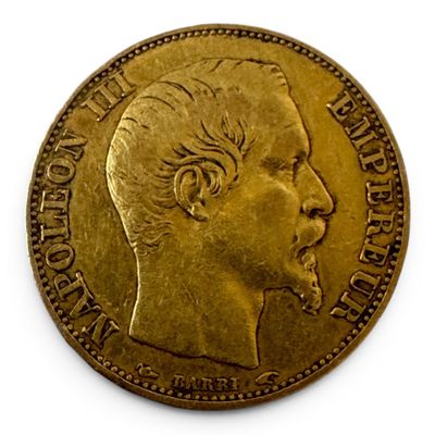 l'image d'une pièce d'or sur laquelle figure le visage d'un homme