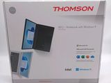 a box with a laptop inside of it on a white surface