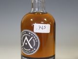 an image of a bottle of whisky sitting on a table