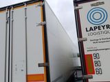two large trucks that are parked next to each other