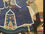 a painting of a man sitting on a throne