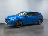 a blue car is parked in a room with a white wall