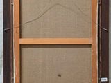 an old picture frame with a piece of fabric hanging on it