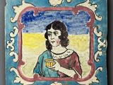 painting of a woman holding a cup of coffee in a blue frame
