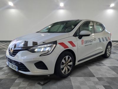 the white car is parked on a checkered floor in the garage