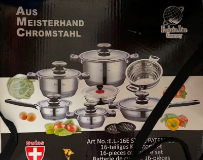 a box with a bunch of pots and pans on it