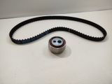 a close up of a belt and a metal object on a table