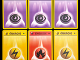 several cards with different energy symbols on them on a black background