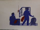 a picture of a blue and white sign with a man and a woman
