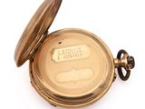 pocket watch on a white background with the word lagoria engraved on the dial