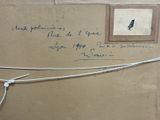 a piece of cardboard with writing on it and a picture of a bird on it
