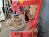 a red machine that is sitting in a room