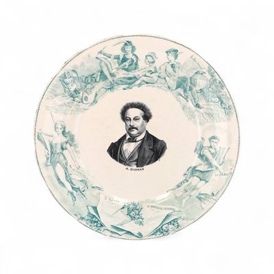 une assiette avec l'image d'un homme dessus