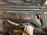 a tool that is sitting on top of a tool case