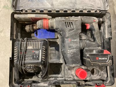 a tool kit in a plastic case on the ground