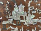 a picture of a wooden table with a lot of decorations on it