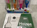 a box of toothbrushes and a box of toothpaste on the floor