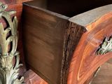 a wooden desk with a drawer on top of it