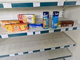 a shelf with some food on it in a store