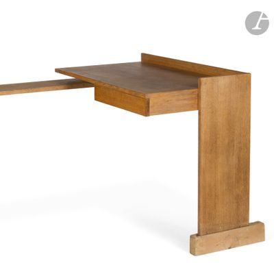 a close up of a wooden desk with a drawer underneath it