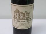 a bottle of wine that is sitting on a table