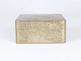 an antique brass box with a scene on it