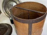 a wooden bucket with a handle and a metal lid