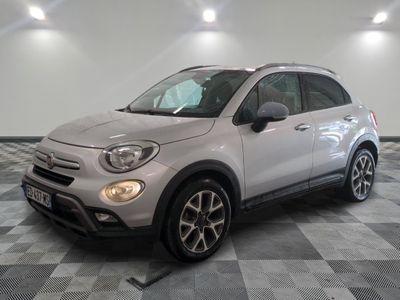 the white fiat suv is parked on a checkered floor
