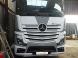 a truck that is parked in a garage