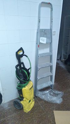 a picture of a room with a ladder and a cleaning machine