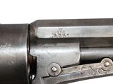 a close up of a gun on a white background