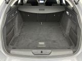 a trunk of a car with the back seats folded down
