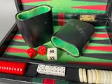 a black case with dice and dice pieces in it