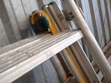 a ladder that is leaning against a wall