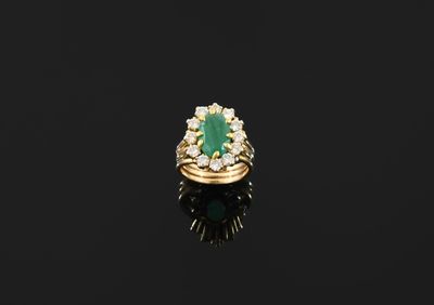 an emerald and diamond ring