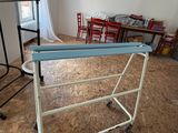 a room that has a table and chairs in it
