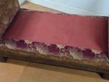 a couch that is sitting on the floor in a room