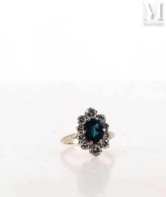 a close up of a ring on a table with a white background