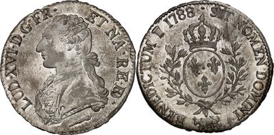 une pièce d'argent surmontée d'une couronne