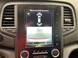 a picture of a car ' s dashboard with a camera mounted on it