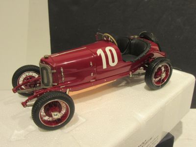 a red model of a race car on display