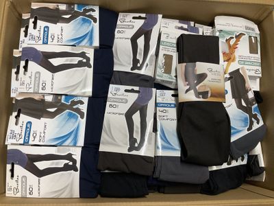 boxes of men ' s black and white tights in a cardboard box