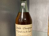 a bottle of wine that is sitting on a table