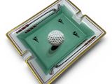 a green tray with a golf ball on it