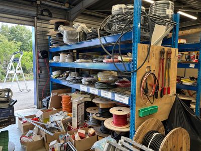 many different types of wires and wires on the shelves