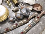a silver tray with various items on top of it