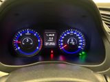 the dashboard of a car with two different gauges on it